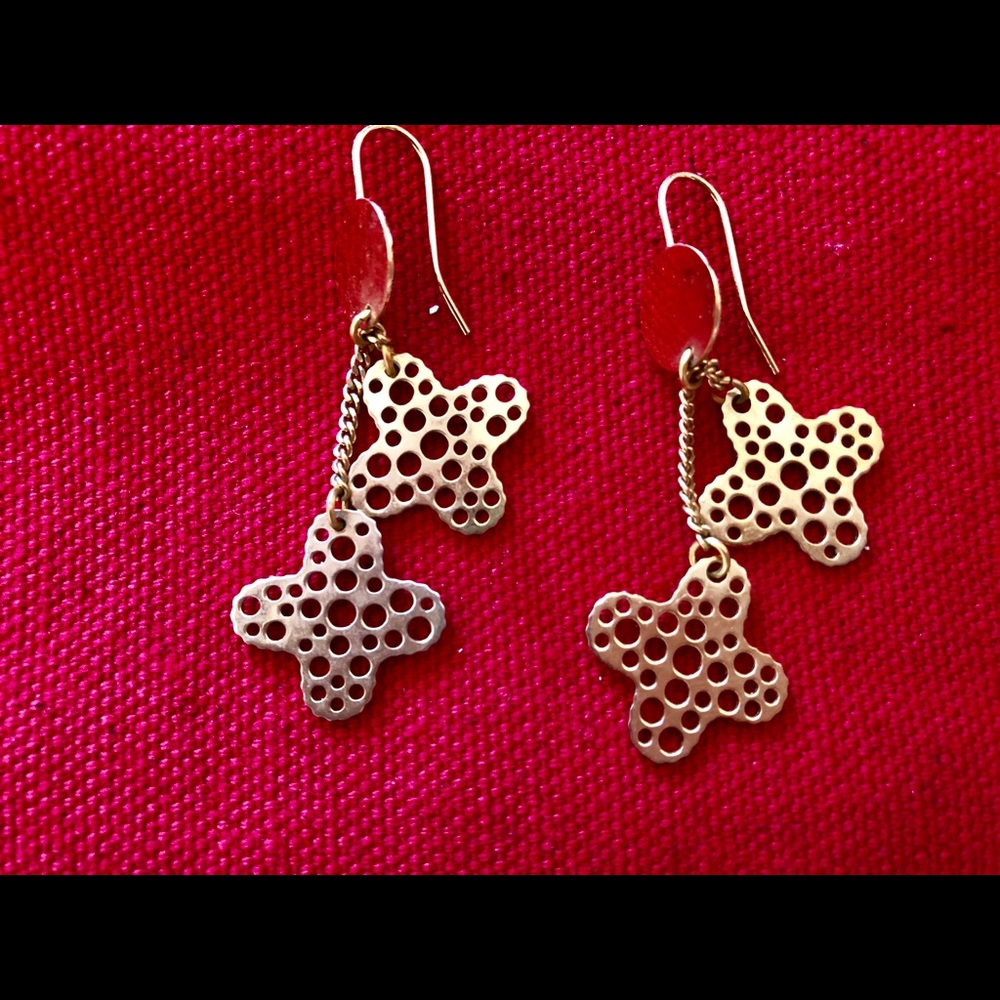Gold plated pierced earrings.